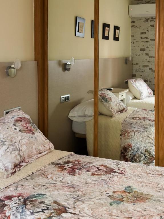 Postel nebo postele na pokoji v ubytování La casita de lola