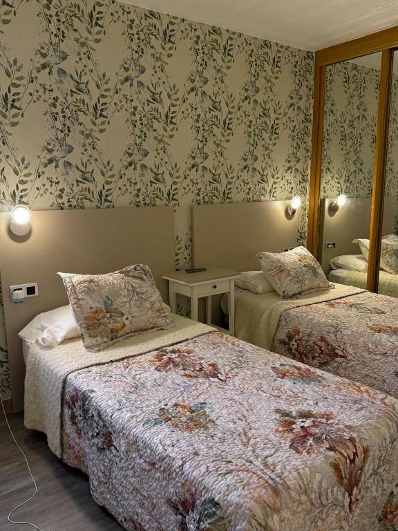 Postel nebo postele na pokoji v ubytování La casita de lola