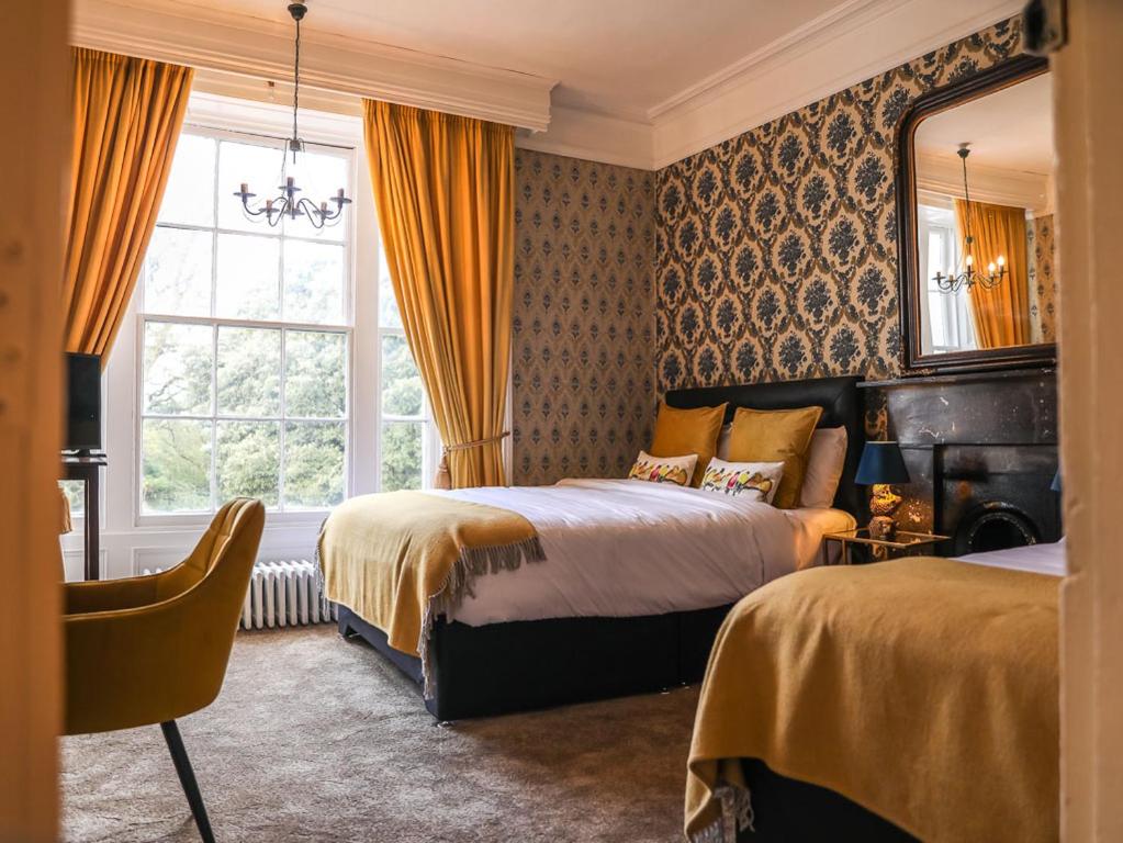 Ένα ή περισσότερα κρεβάτια σε δωμάτιο στο Springfort Hall Hotel
