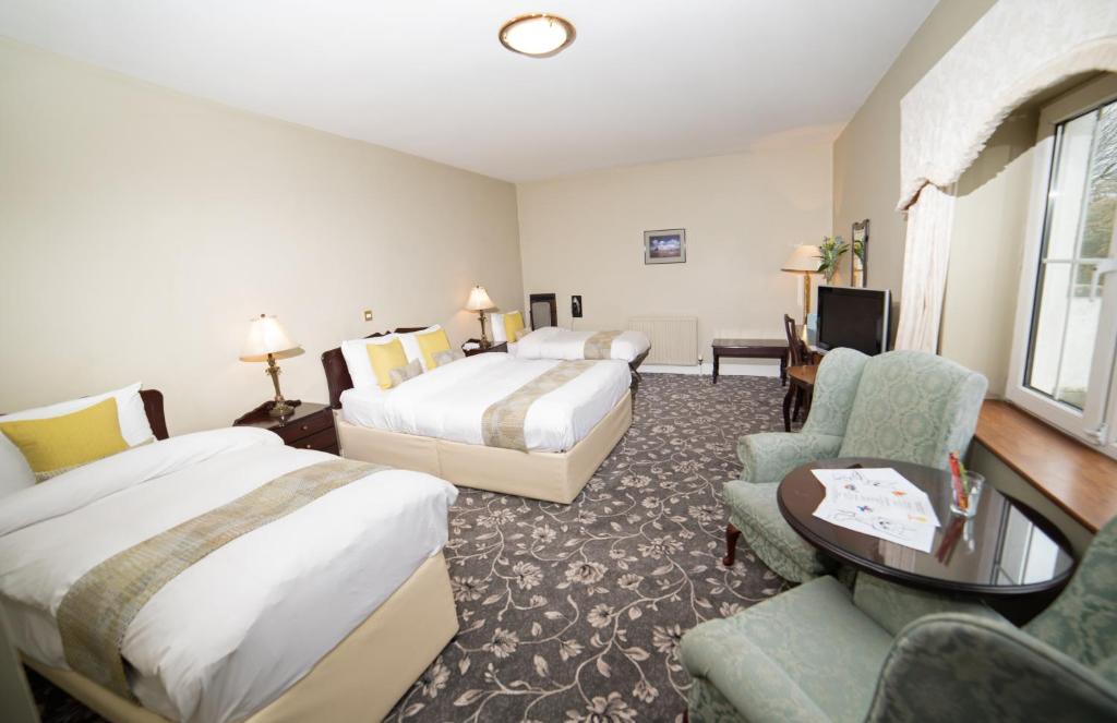 Ένα ή περισσότερα κρεβάτια σε δωμάτιο στο Springfort Hall Hotel