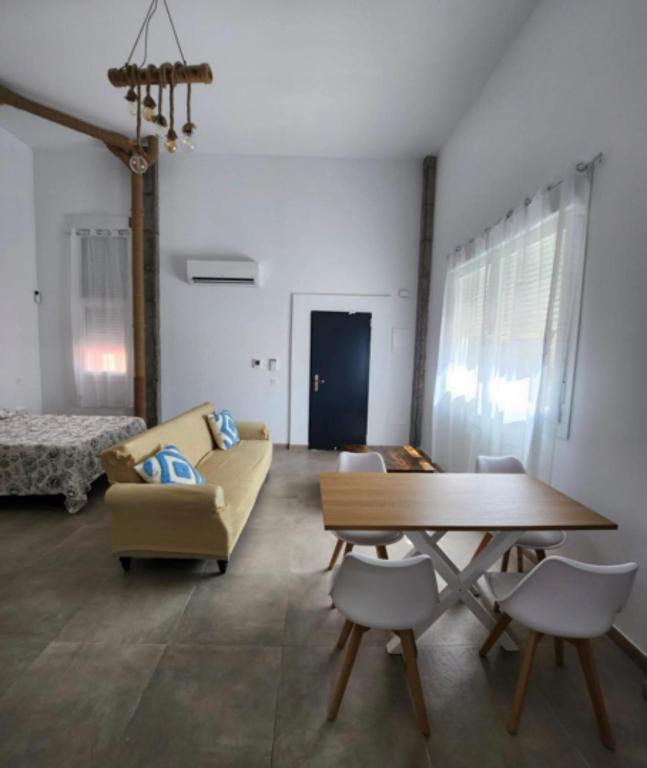 a living room with a couch and a table at Paseo de la rambla A in Valdemoro