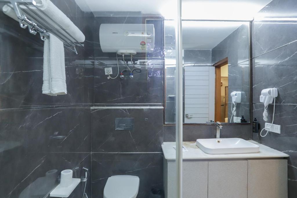 Koupelna v ubytování Red Rose Homestay - Rooms with Kitchenette