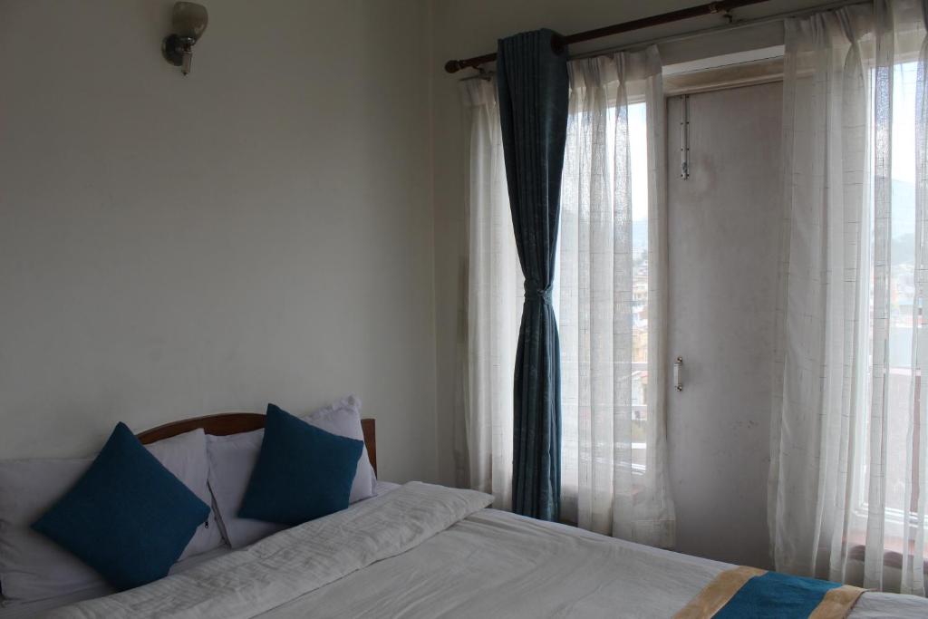 Postel nebo postele na pokoji v ubytování 32 Peace Home