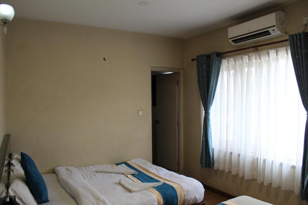 Postel nebo postele na pokoji v ubytování 32 Peace Home