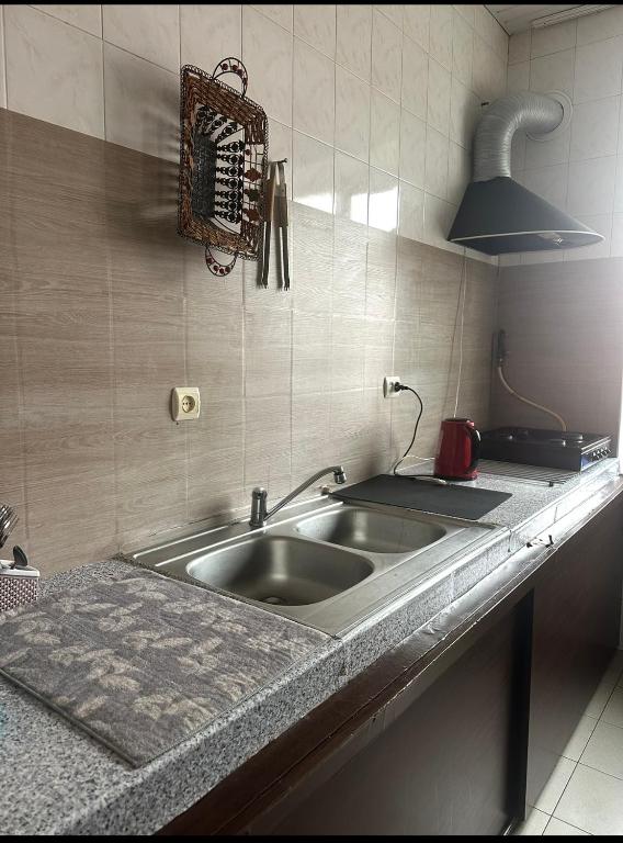 Kuchyň nebo kuchyňský kout v ubytování Welcome 24 Mukachevo