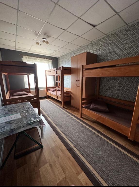 Postel nebo postele na pokoji v ubytování Welcome 24 Mukachevo