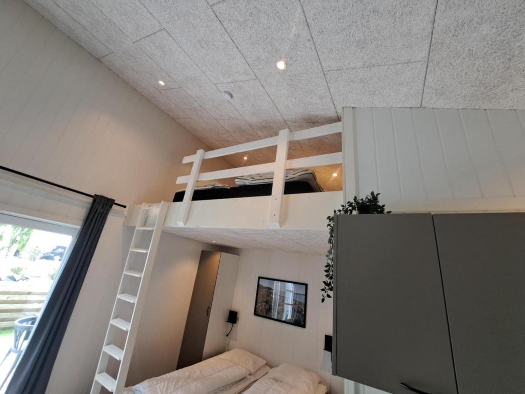 Postel nebo postele na pokoji v ubytování Motel Glyngøre