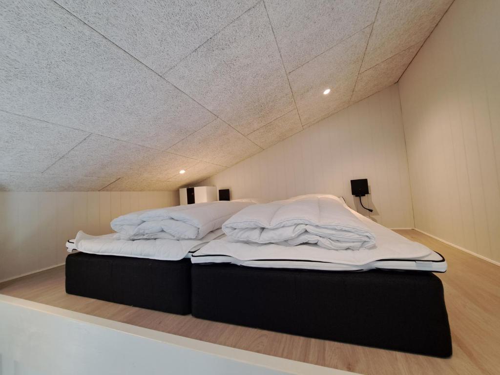 Postel nebo postele na pokoji v ubytování Motel Glyngøre