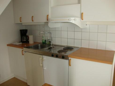 Kuchyň nebo kuchyňský kout v ubytování Kalmar Sjömanshem