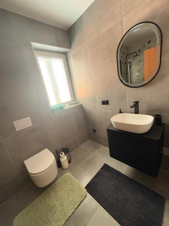 Koupelna v ubytování Apartment Teleferica Rabac