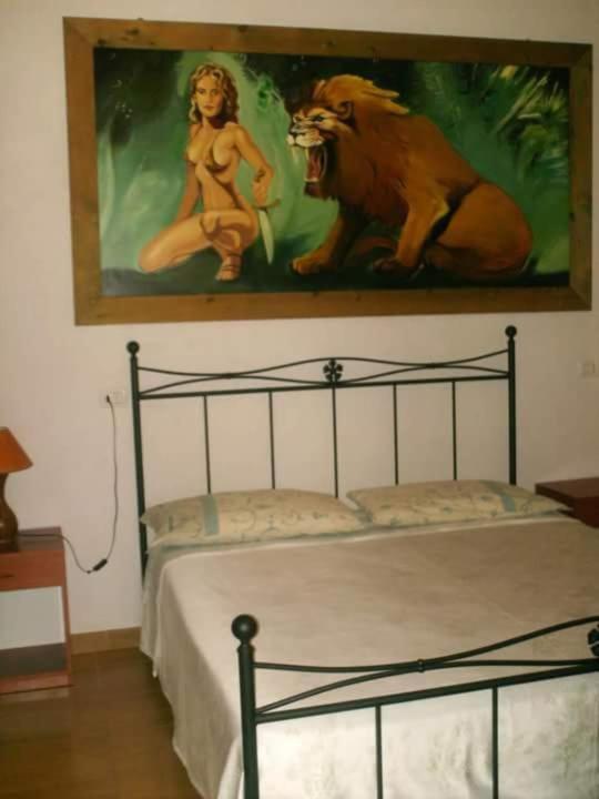 Postel nebo postele na pokoji v ubytování L'Antico Carrettiere
