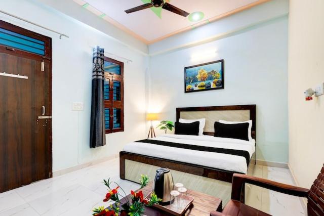 Postel nebo postele na pokoji v ubytování Hotel Royal Residency