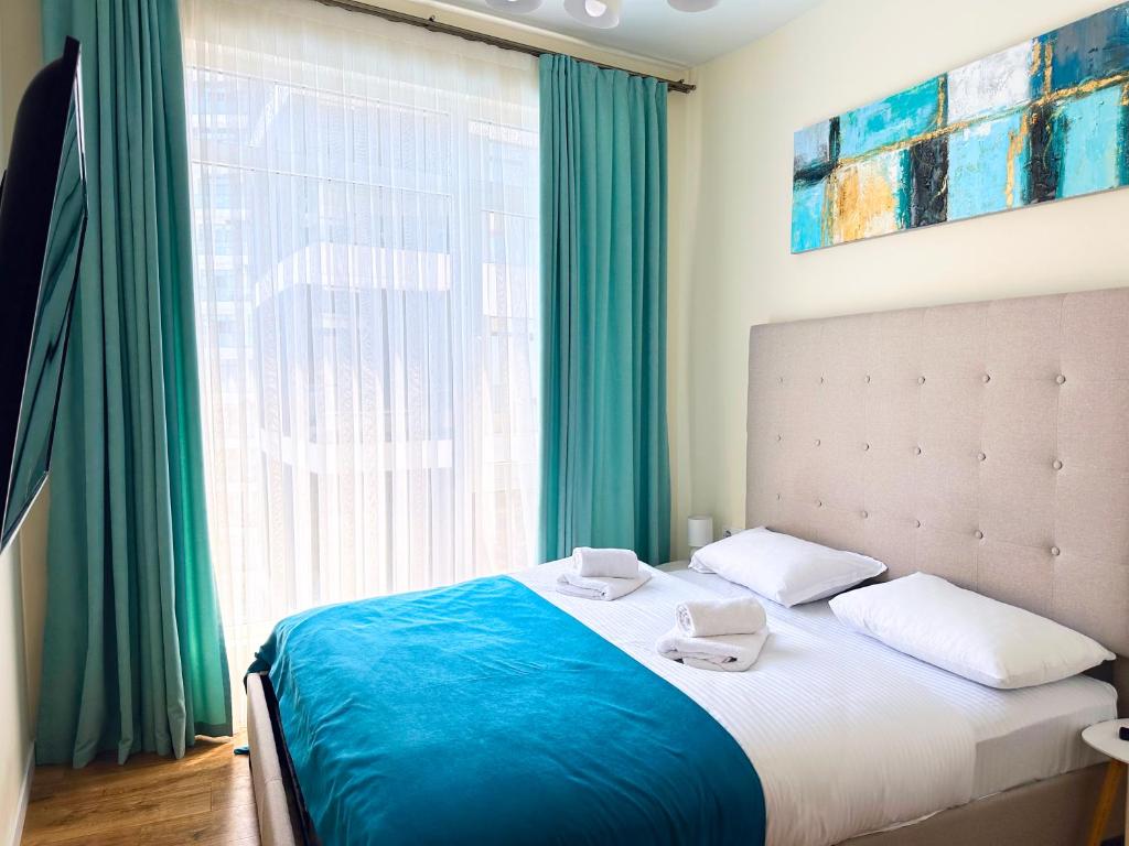 Postel nebo postele na pokoji v ubytování BATUMI BOULEVARD RESORT