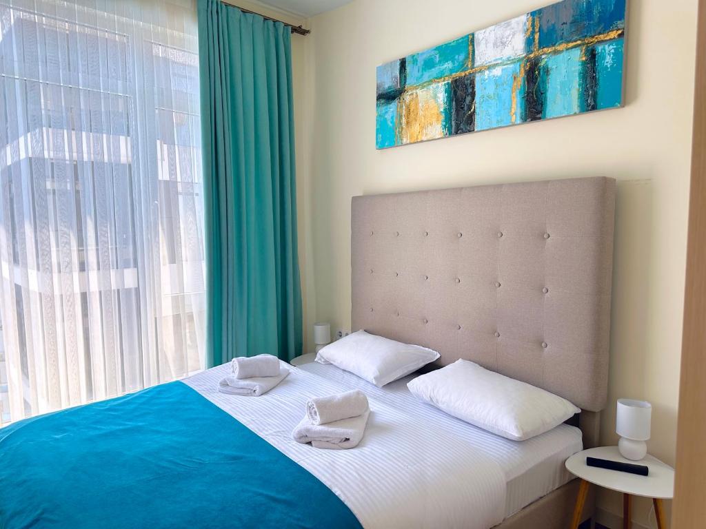 Postel nebo postele na pokoji v ubytování BATUMI BOULEVARD RESORT