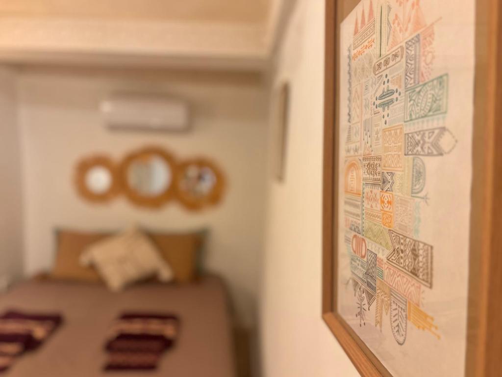Postel nebo postele na pokoji v ubytování Riad Sanwa