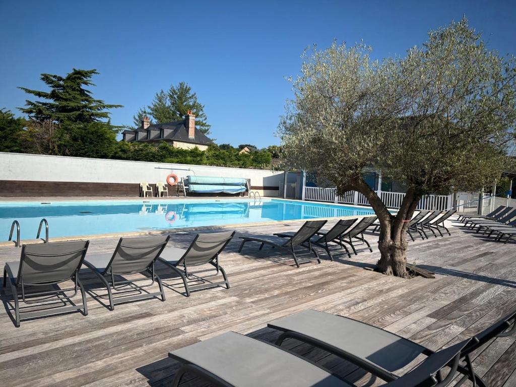 Piscina de la sau aproape de appartement en résidence privée avec piscine