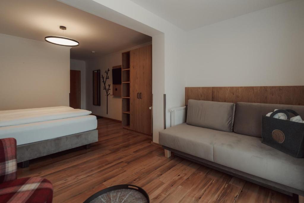 Postel nebo postele na pokoji v ubytování Hotel Tannenberg