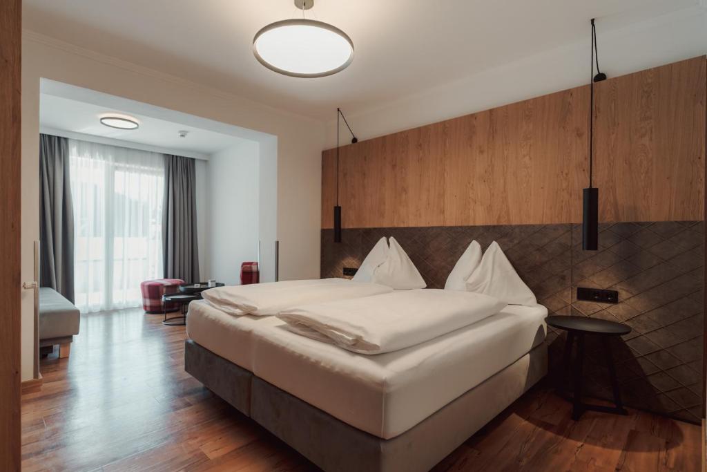 Postel nebo postele na pokoji v ubytování Hotel Tannenberg
