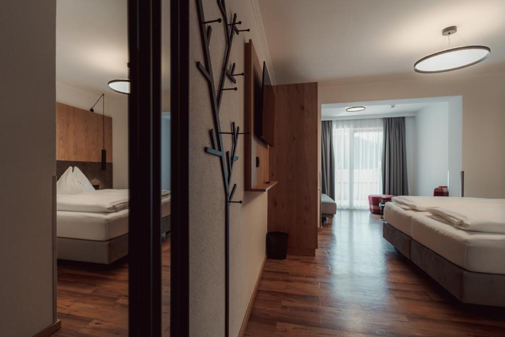Postel nebo postele na pokoji v ubytování Hotel Tannenberg