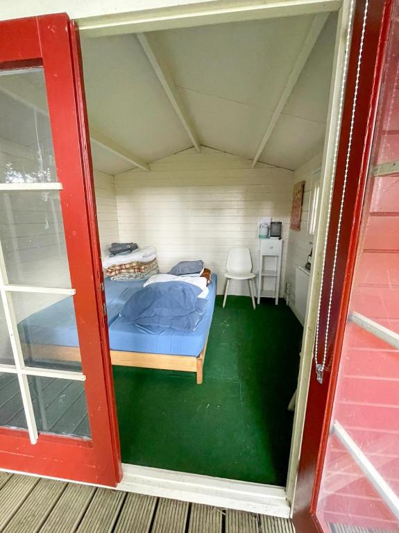 Postel nebo postele na pokoji v ubytování Camping de Heemtuin