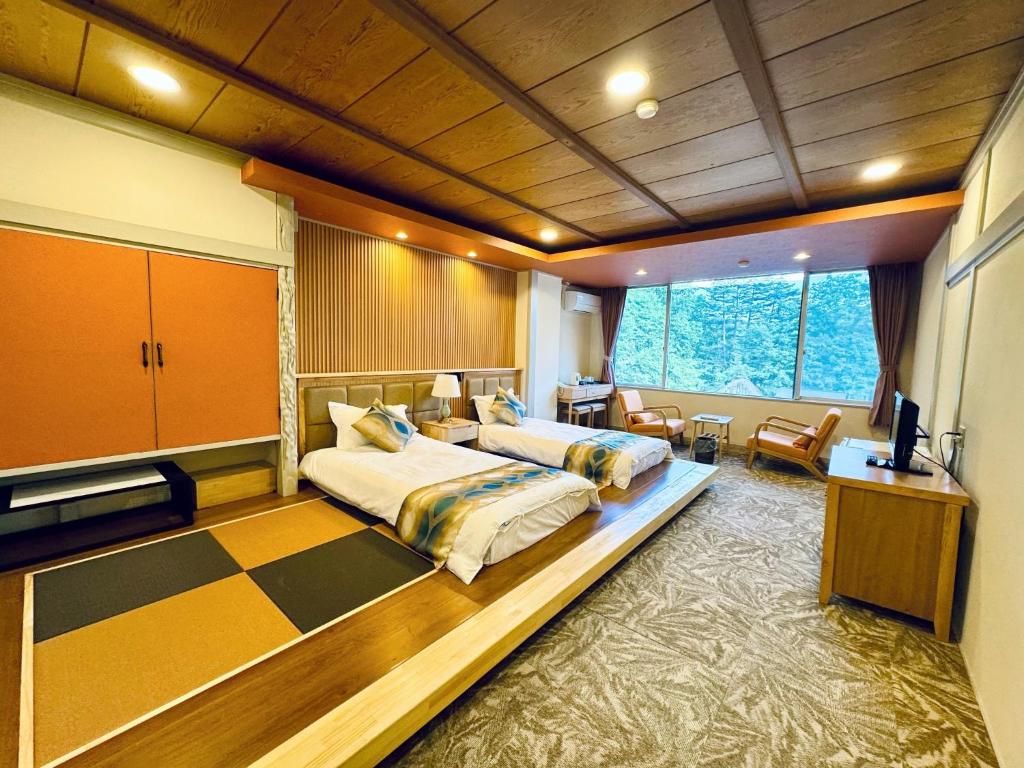 Giường trong phòng chung tại Kurobe Sun Valley Hotel - Vacation STAY 97443v