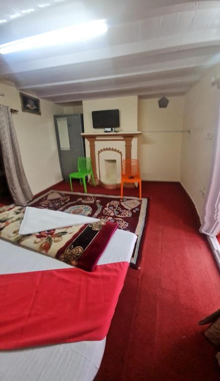 Postel nebo postele na pokoji v ubytování The Heritage jasmine lodge B&B