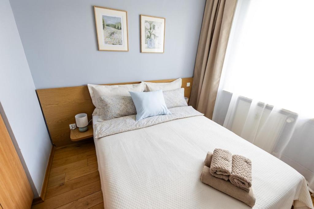 Postel nebo postele na pokoji v ubytování Makówka na Krupówkach by Meadow Stay Apartments