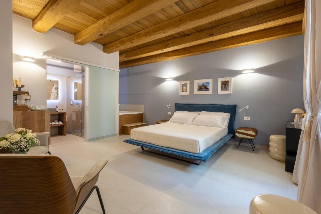 Postel nebo postele na pokoji v ubytování Palazzo Anelli - Rooms & Relax