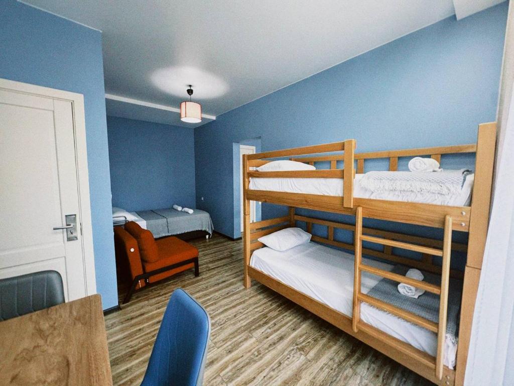 Postel nebo postele na pokoji v ubytování Aquamarinn