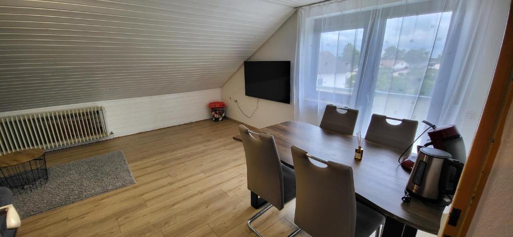 TV a/nebo společenská místnost v ubytování Wohnung Zentral Crailsheim