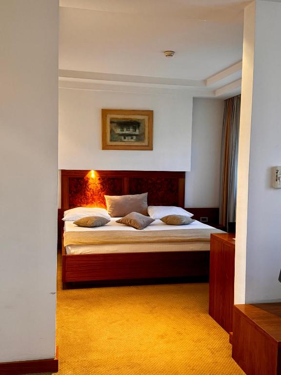 Postel nebo postele na pokoji v ubytování Hotel Exclusive