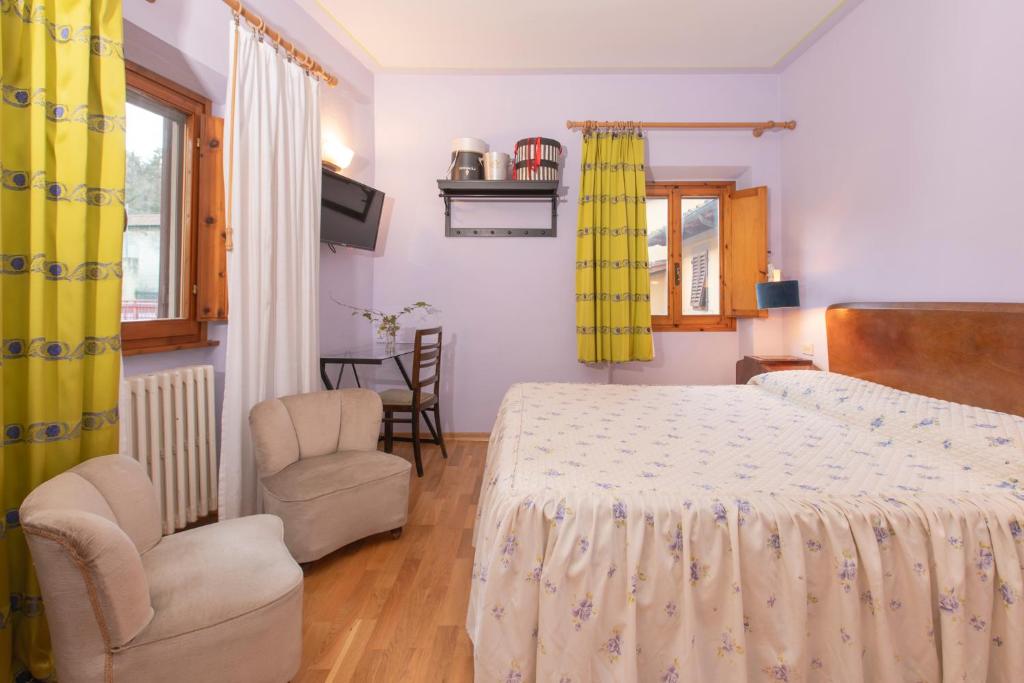 Postel nebo postele na pokoji v ubytování Albergo La Felicina - Mugello
