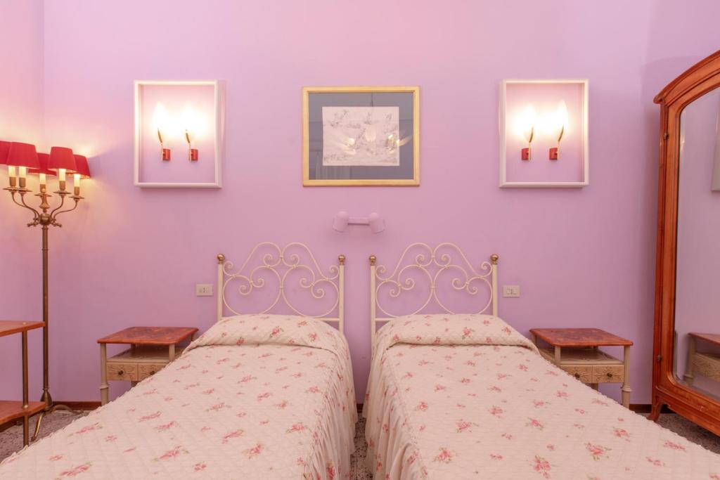 Postel nebo postele na pokoji v ubytování Albergo La Felicina - Mugello