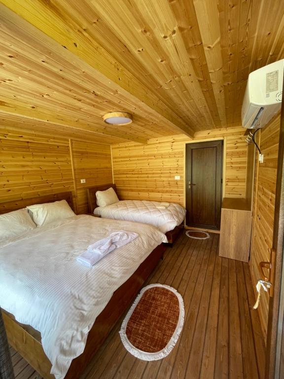 Letto o letti in una camera di BUJTINA IZET SELIMAj
