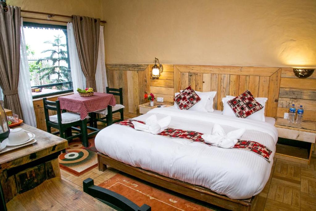 Una cama o camas en una habitación de Hotel Tourist Residency