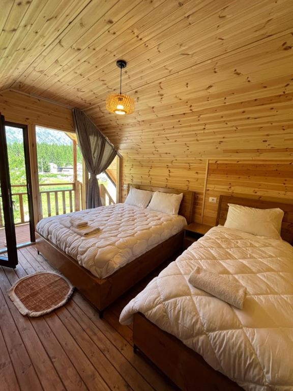 Letto o letti in una camera di BUJTINA IZET SELIMAj