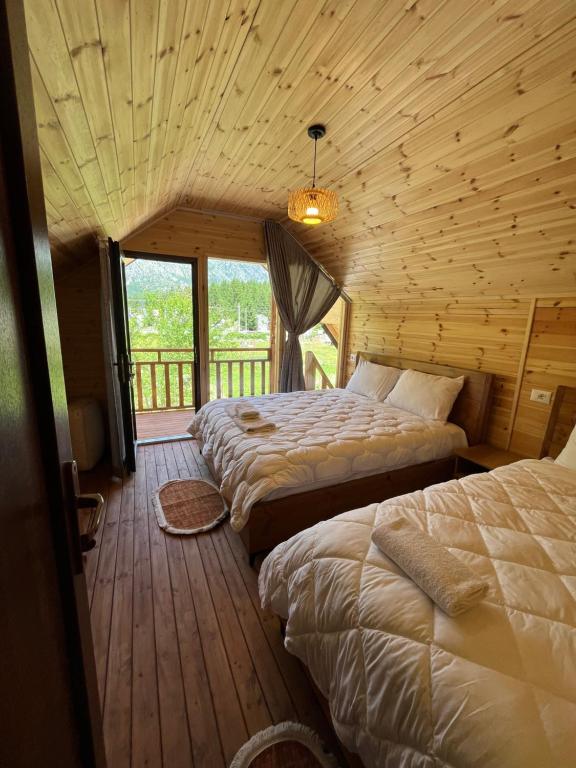 Letto o letti in una camera di BUJTINA IZET SELIMAj