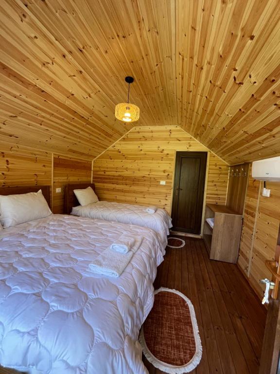 Letto o letti in una camera di BUJTINA IZET SELIMAj