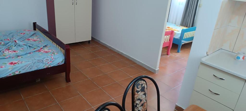 Postel nebo postele na pokoji v ubytování Hotel LULI