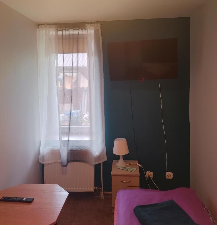 Postel nebo postele na pokoji v ubytování Hostel u Misiów