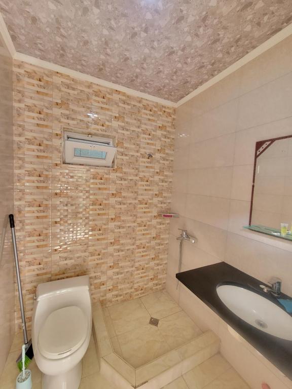 Koupelna v ubytování Guest House Deme