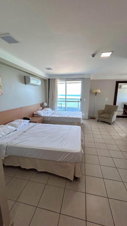 Postel nebo postele na pokoji v ubytování Flat Beira Mar em Recife
