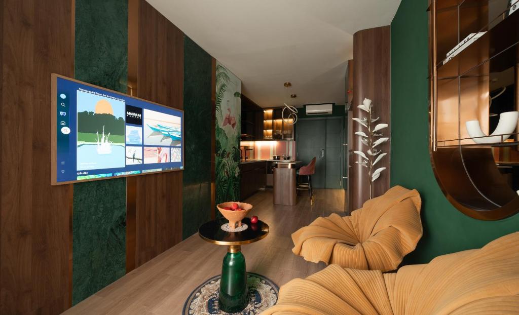 Μια τηλεόραση ή/και κέντρο ψυχαγωγίας στο Apartment Terra Royal, 280 Nam Kỳ Khởi Nghĩa, Quận 3, thành phố Hồ Chí Minh