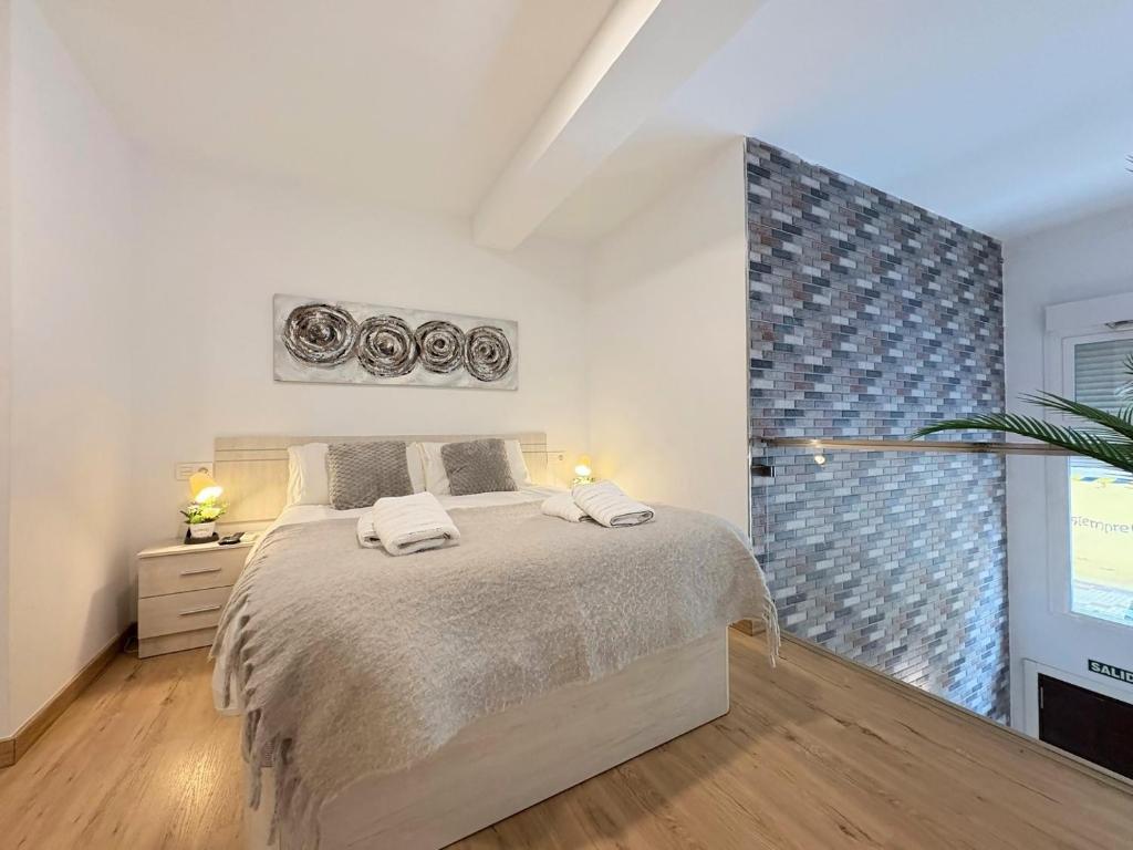 Posteľ alebo postele v izbe v ubytovaní Duplex Huelin II & Beach