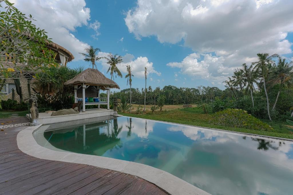 Bazén v ubytování Coco Verde Bali Resort nebo v jeho okolí
