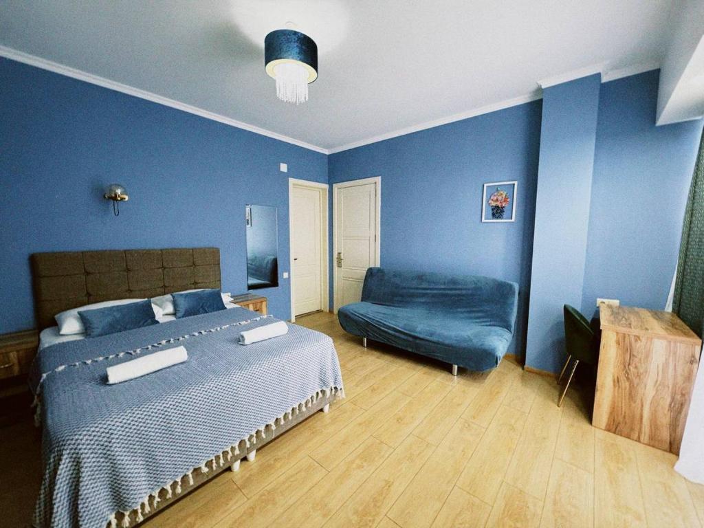Postel nebo postele na pokoji v ubytování Aquamarinn