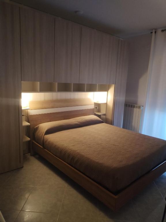 Postel nebo postele na pokoji v ubytování RIU b&b ALGHERO