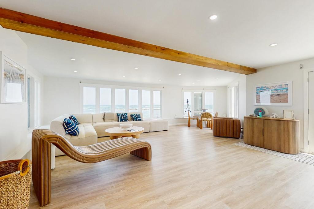 a living room with a couch and a table at Sea Gold in Wells