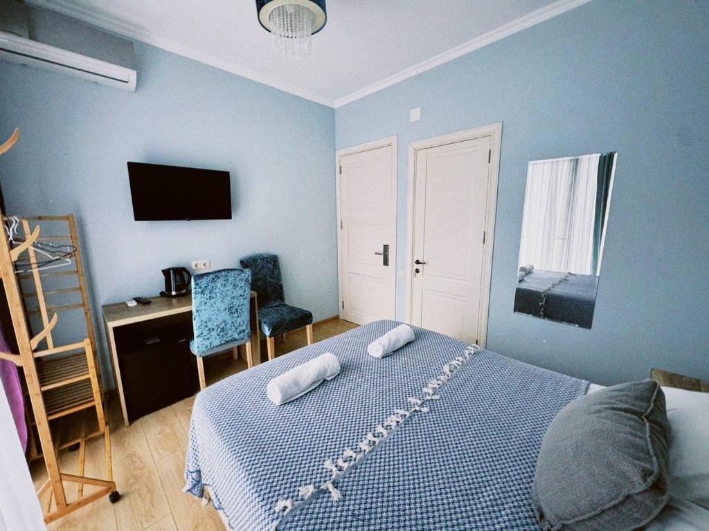 Postel nebo postele na pokoji v ubytování Aquamarinn