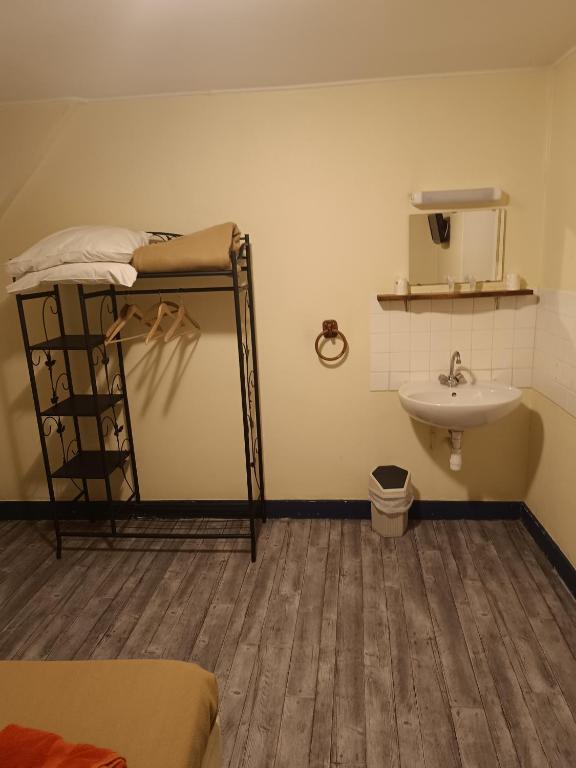 Postel nebo postele na pokoji v ubytování Le Terminus